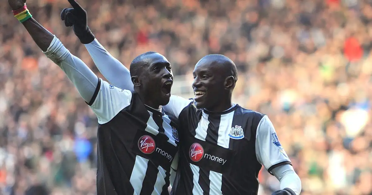 Newcastle's Papiss Cisse and Demba Ba celebrate against Blackburn. St James' Park, Newcastle, February 2012.