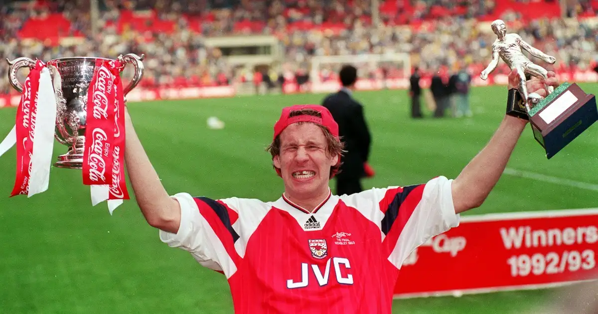 Arsenal's Paul merson celebrates at Wembley after his team won the Coca Cola Cup Final against Sheffield Wednesday. He is holding the Cup and Man of the Match trophies. 18 April 1993