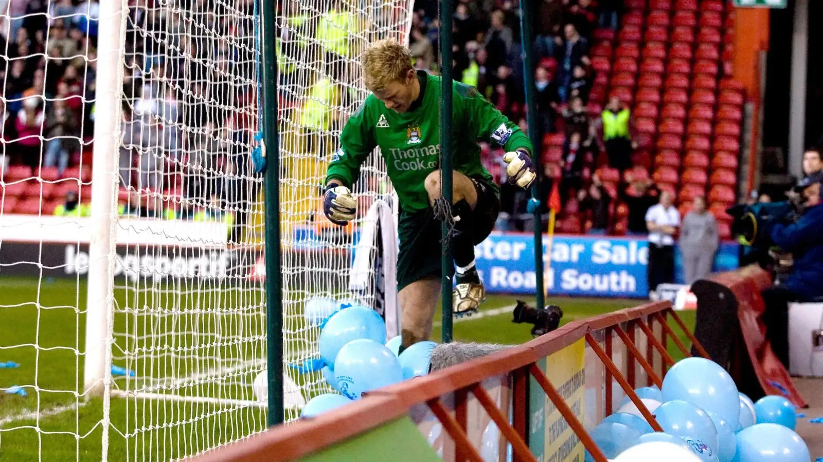 Manchester City goalkeeper Joe Hart burst balloons after Sheffield United's Luton Sherton scores during the FA Cup Fourth Round match at Bramall Lane, Sheffield.