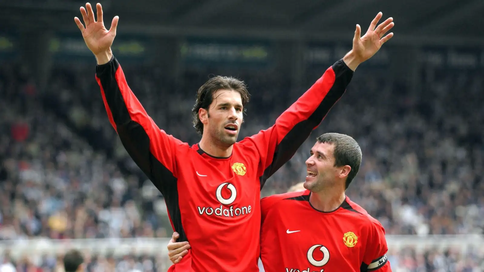 Ruud van Nistelrooy and Roy Keane celebrate scoring for Manchester United against Newcastle United at St James' Park, Newcastle, April 2003.