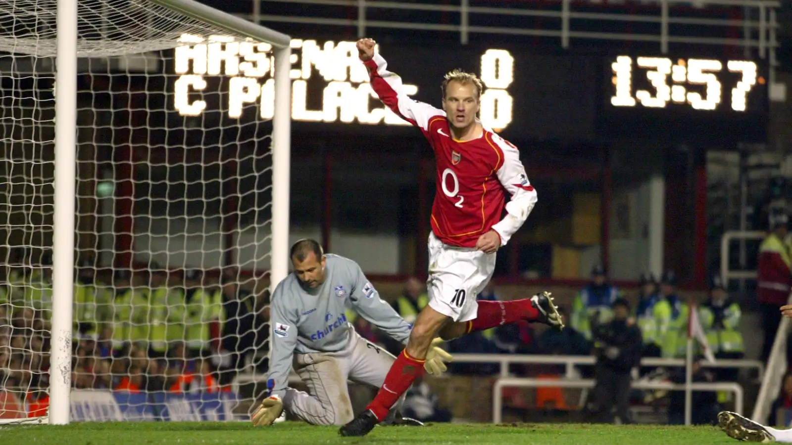 Arsenal's Dennis Bergkamp celebrates after scoring the opening goal as part of the Premier League's first all-foreign starting XI vs Crystal Palace, February 14th, 2005