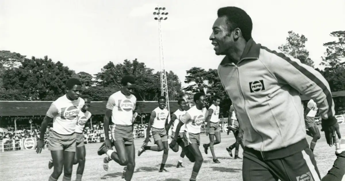 Brazilian football hero Pele conducting a youth coaching clinic in Nairobi Kenya in 1976