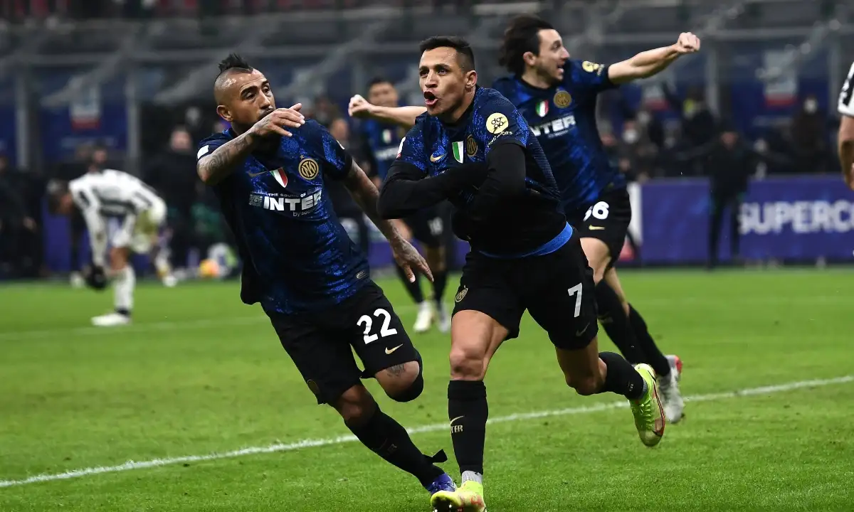 Inter Milan's Alexis Sanchez celebrates after scoring against Juventus in the Supercoppa Italiana. January 2022, San Siro.