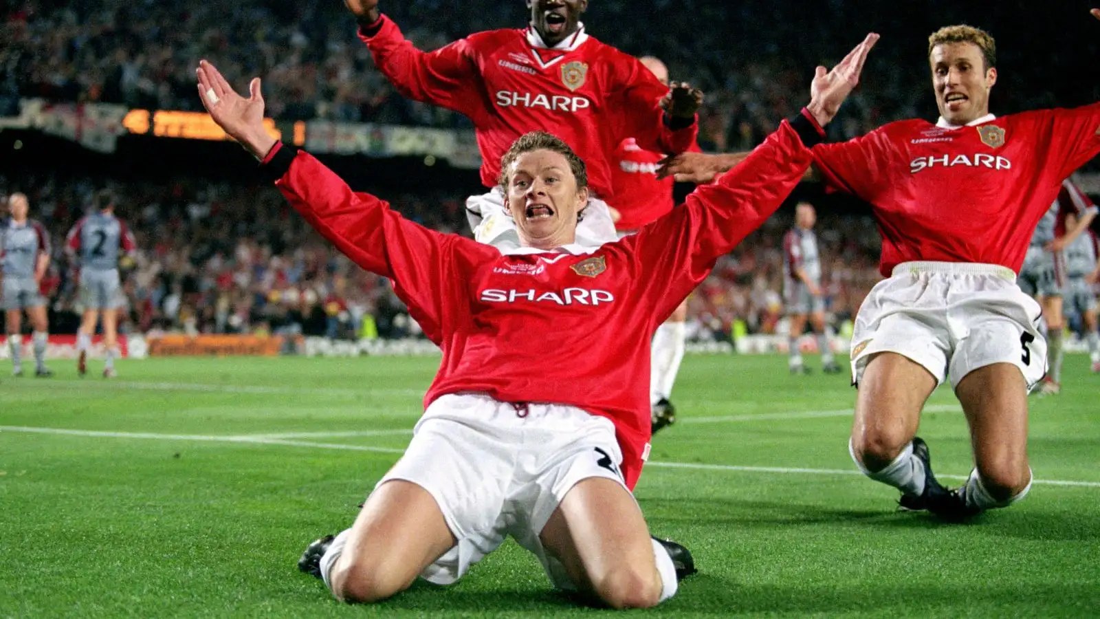 Ole Gunnar Solskjaer celebrates with Dwight Yorke and Ronny Johnsen during the Champions League Final between Manchester United and Bayern Munich. Camp Nou, Barcelona, Spain. 26 May 1999.