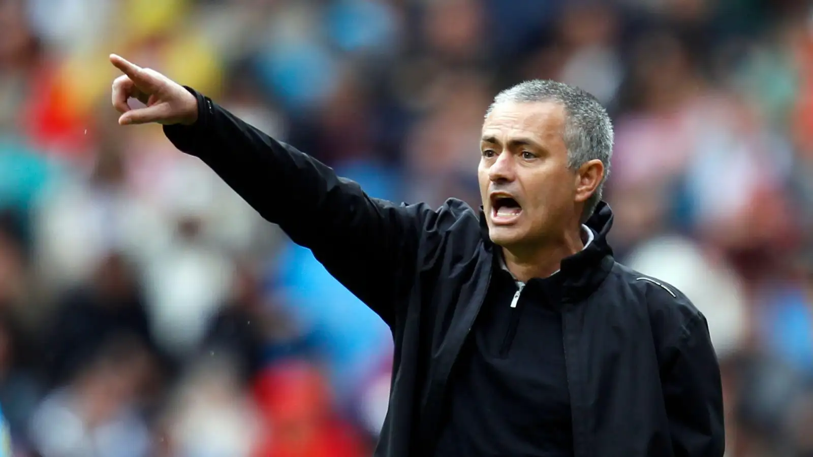 Real Madrid manager Jose Mourinho shouts instructions during his side's La Liga match with Sevilla at Santiago Bernabeu, Madrid, April 2012.