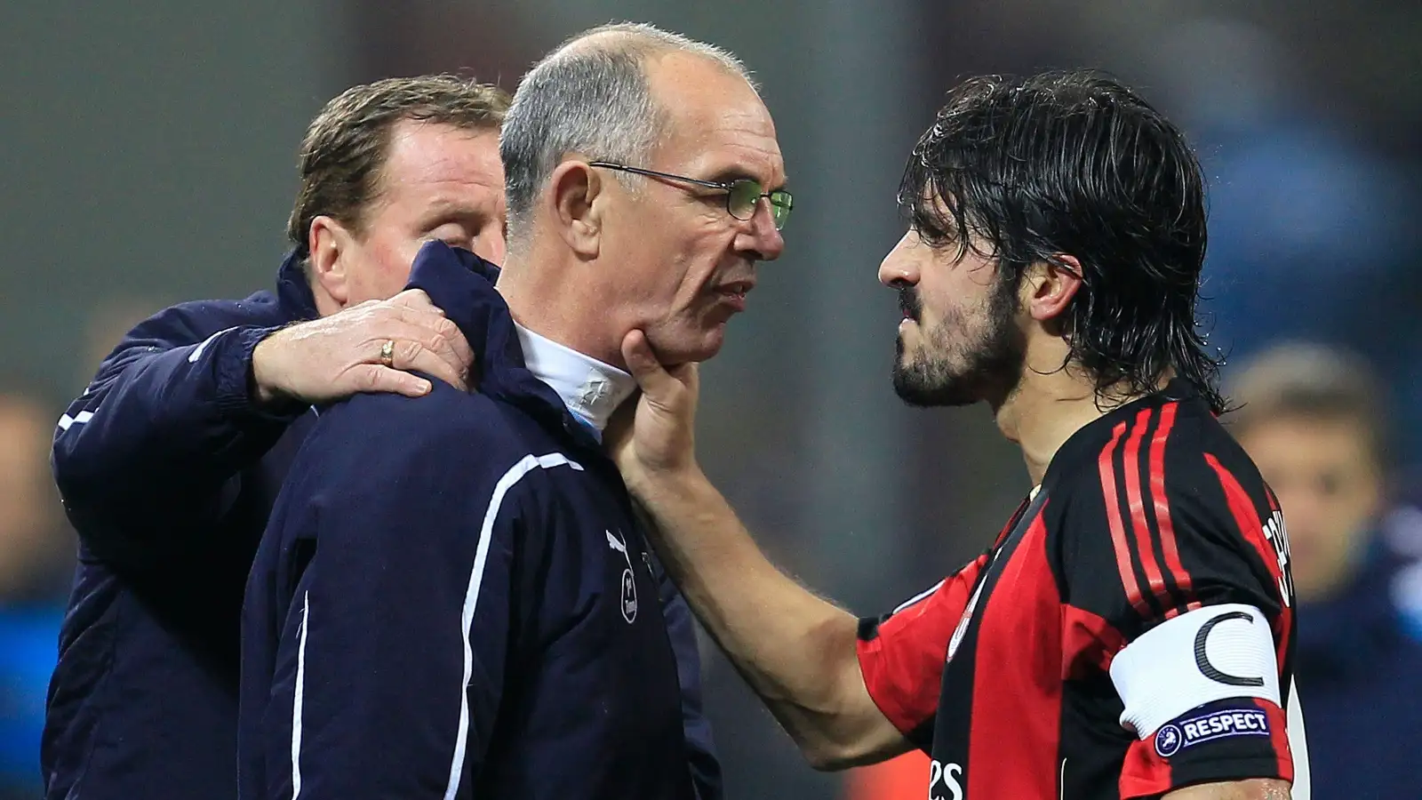 AC Milan's Gennaro Gattuso (R) argues with Tottenham Hotspur's first team coach Joe Jordan (C) next to manager Harry Redknapp during the Champions League match at San Siro, Milan, Italy, February 2011.