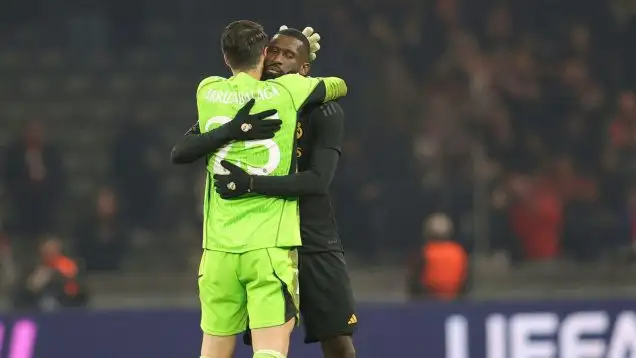 Antonio Rudiger embraces Kepa.