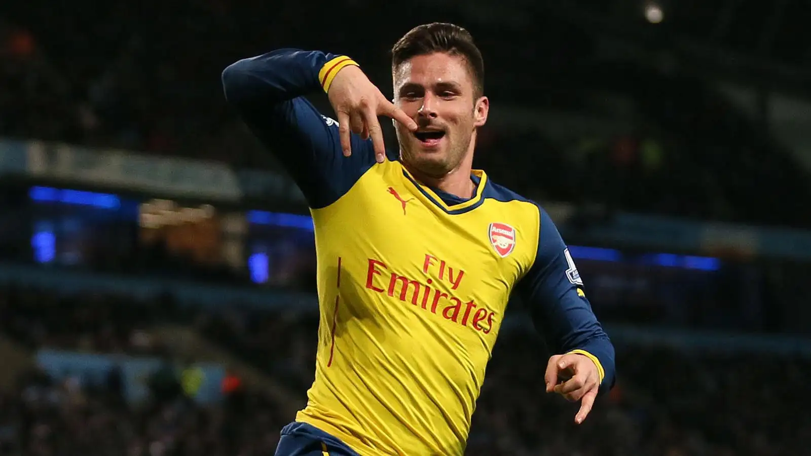 Manchester, United Kingdom - Olivier Giroud of Arsenal celebrates scoring the second goal - Barclays Premier League - Manchester City vs Arsenal