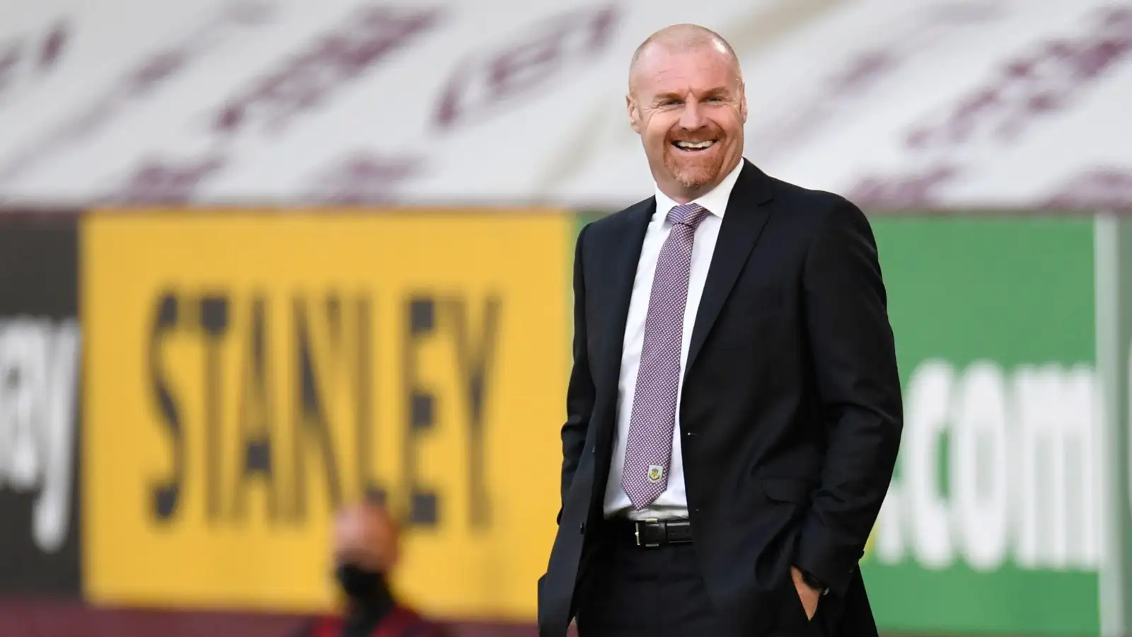 Burnley's manager Sean Dyche smiles during the English League Cup soccer match between Burnley and Sheffield United at the Turf Moor stadium in Burnley, England, Thursday, Sept. 17, 2020.