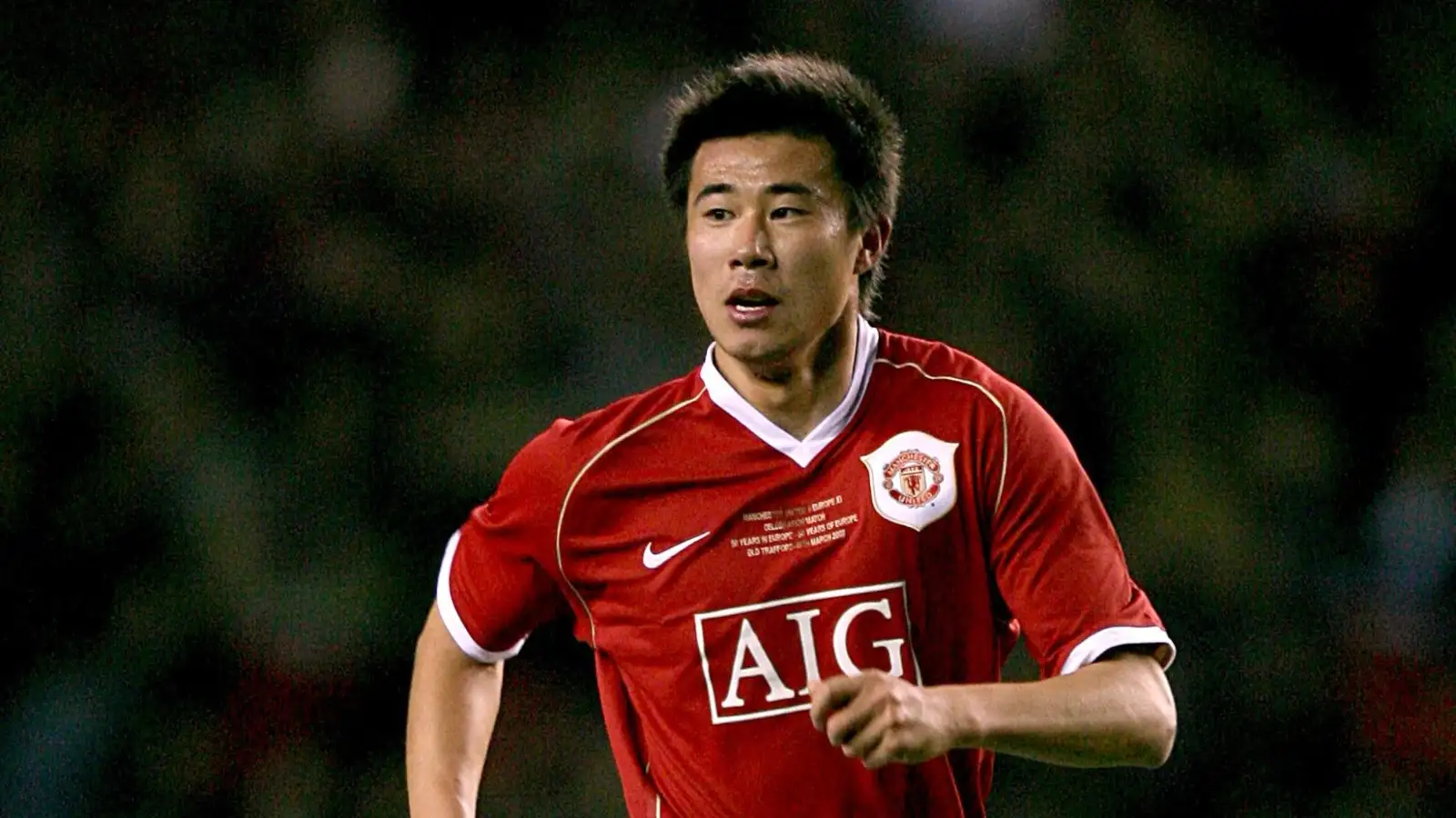 Dong Fangzhuo playing for Manchester United in their exhibition match against Europe XI as part of UEFA's 50th anniversary celebrations at Old Trafford in 2007.