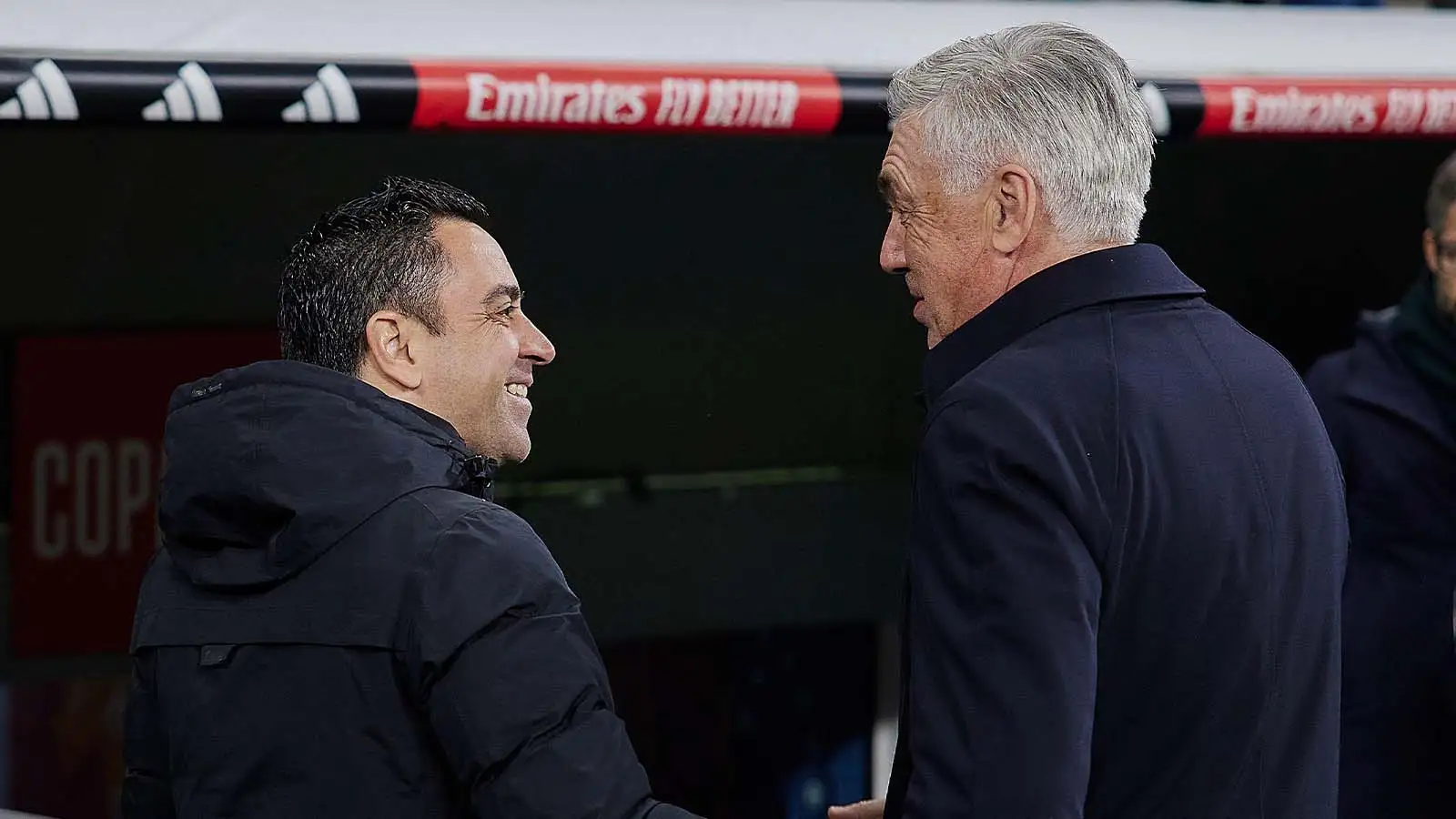 Real Madrid's Carlo and Barcelona's Xavi