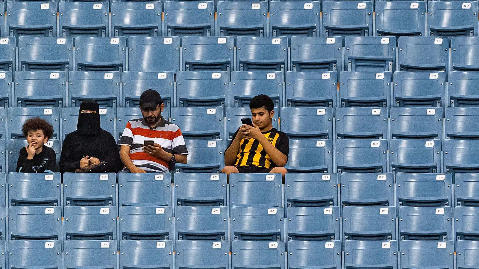 Al Ittihad fans in an empty stadium