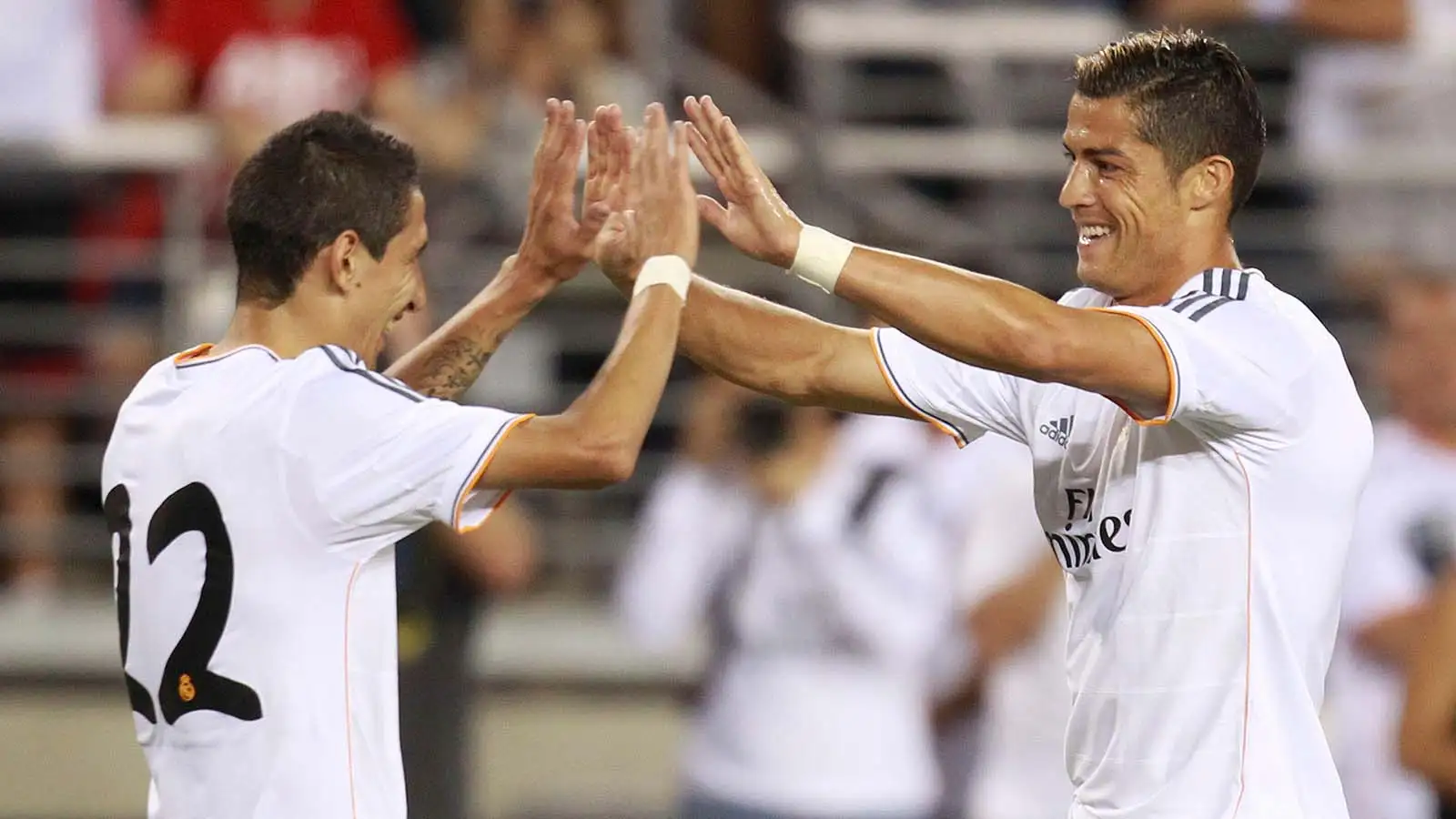 Angel Di Maria celebrates with Cristiano Ronaldo