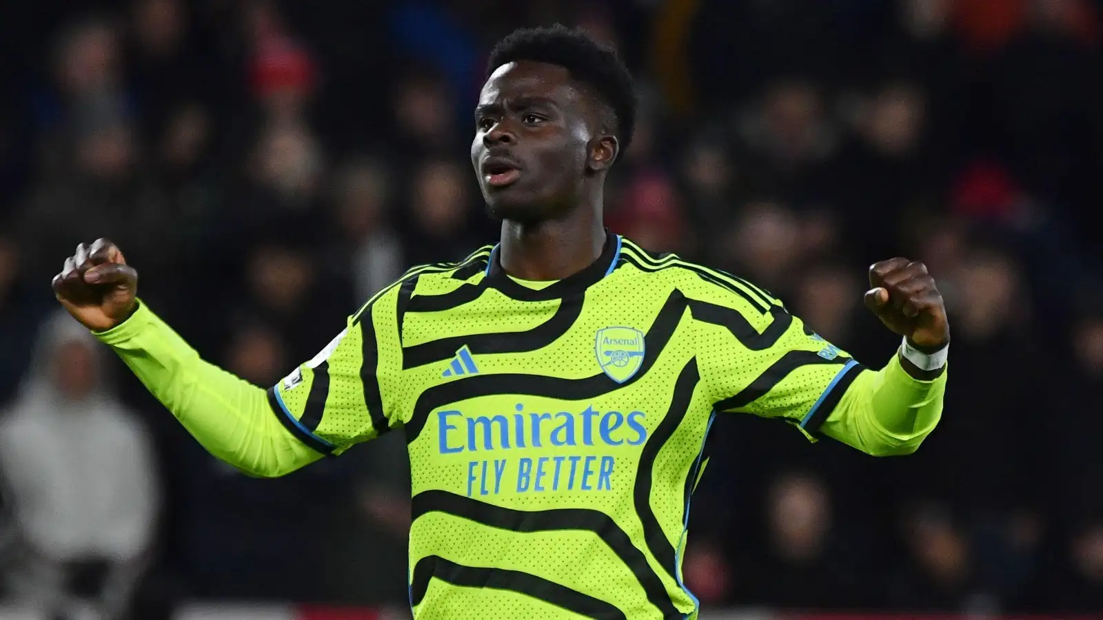 Arsenal's Bukayo Saka celebrates after scoring his side's second goal during the English Premier League soccer match between Nottingham Forest and Arsenal at the City Ground stadium in Nottingham, England, Tuesday, Jan. 30, 2024.