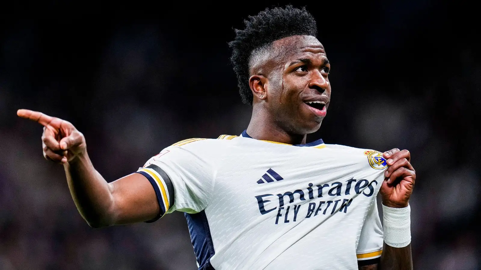 Real Madrid's Vinicius Junior celebrates after scoring the opening goal during a Spanish La Liga soccer match between Real Madrid and Girona at the Santiago Bernabeu stadium in Madrid, Spain, Saturday, Feb. 10, 2024.