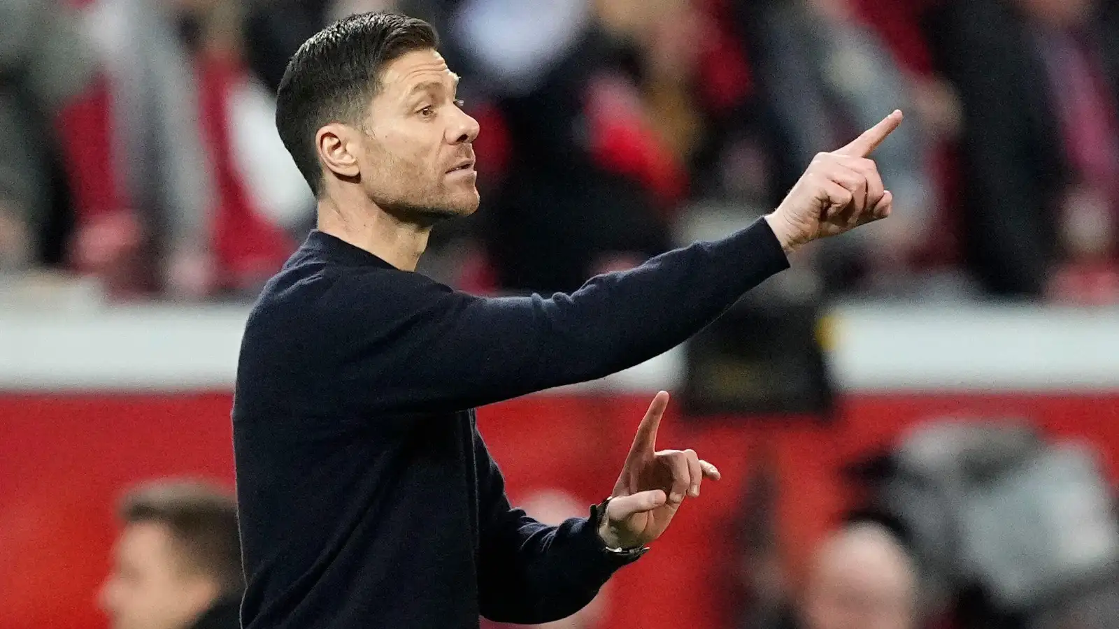 Leverkusen's head coach Xabi Alonso gestures during the German Bundesliga soccer match between Bayer 04 Leverkusen and FC Bayern Munich at the BayArena in Leverkusen, Germany, Saturday, Feb. 10, 2024.