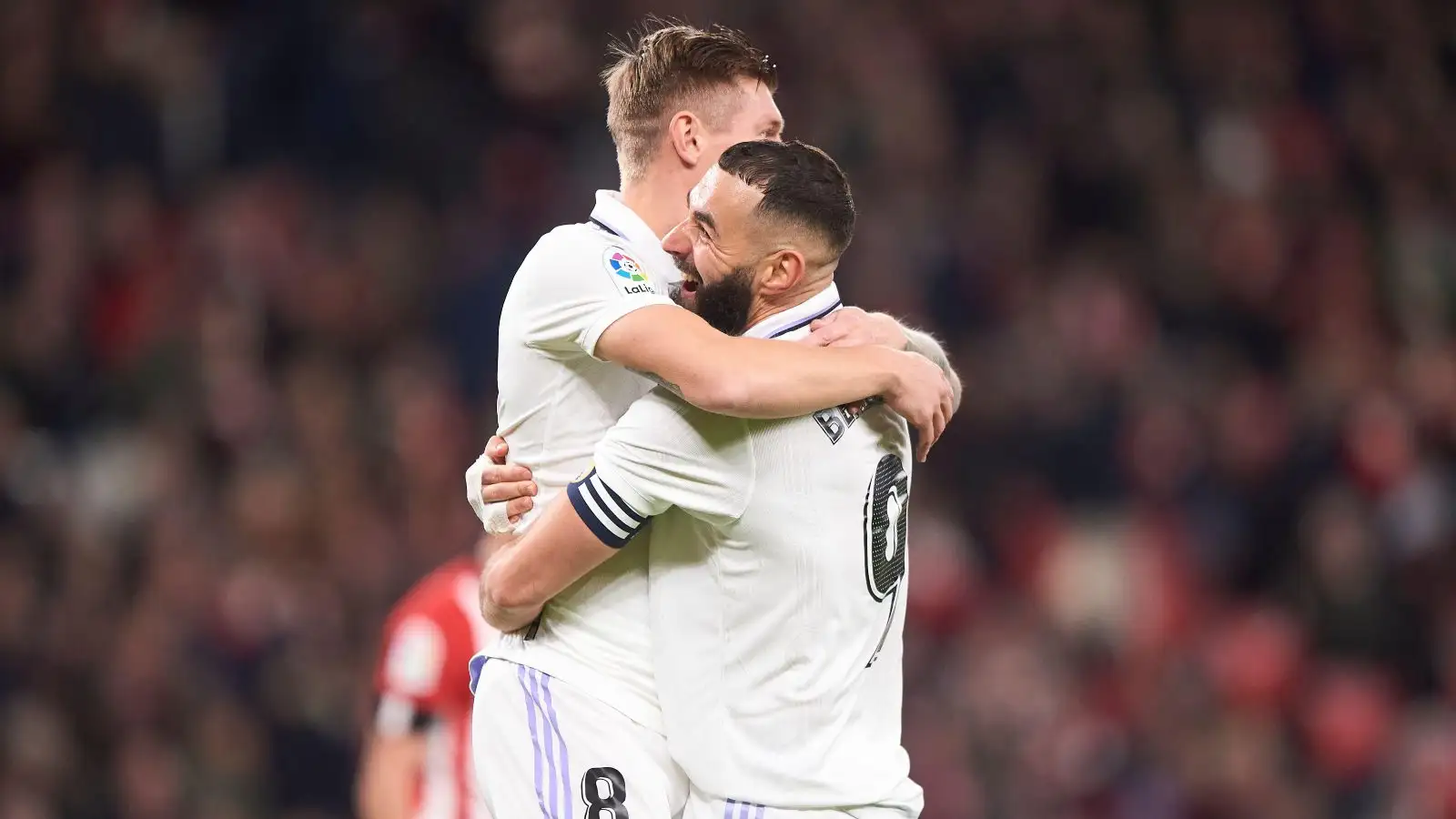 Toni Kroos and Karim Benzema celebrate