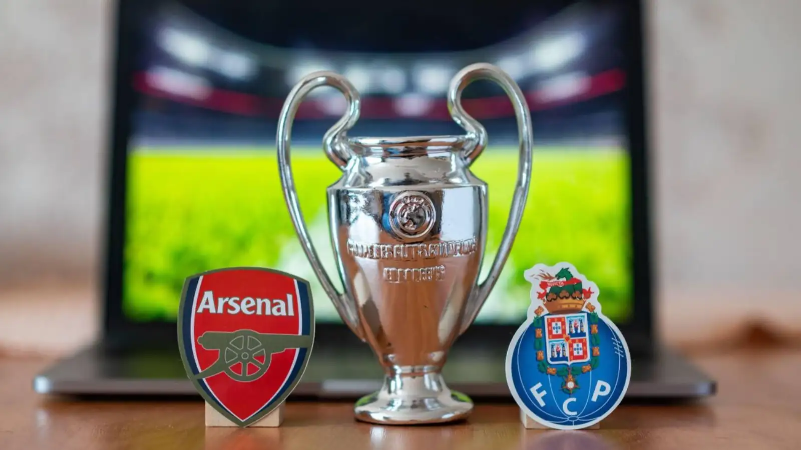 January 3, 2024, London, United Kingdom. Emblems of football clubs participating in the UEFA Champions League playoffs FC Porto and Arsenal F.C.