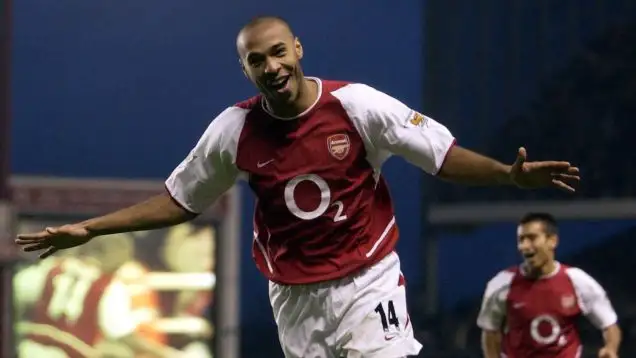 Henry celebrating one of his many, many goals for Arsenal.