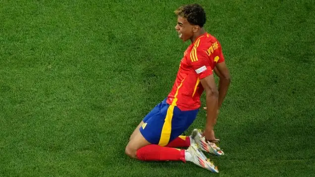 Barcelona wonderkid Lamine Yamal celebrates scoring his long-range goal in the Euro 2024 semi-final against France by sliding on his knees