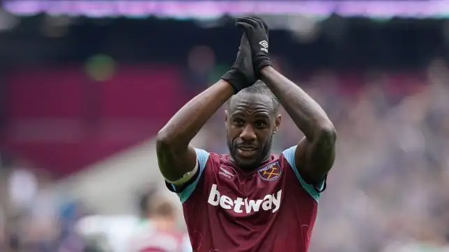 Michail Antonio applauds supporters.