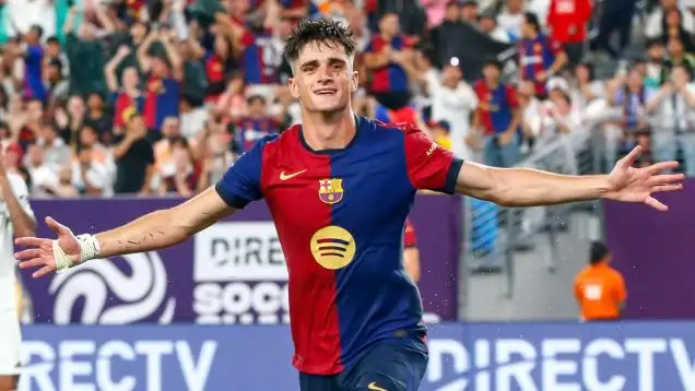 Pau Victor celebrates for Barcelona.