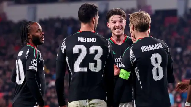 Eindhoven, Netherlands. 04th Mar, 2025. EINDHOVEN, NETHERLANDS - MARCH 4: Martin Odegaard of Arsenal FC celebrates after scoring his teams sixth goal, Leandro Trossard of Arsenal FC during the UEFA Champions League 2024/25 Round of 16 First Leg match between PSV and Arsenal FC at PSV Stadion on March 4, 2025 in Eindhoven, Netherlands.