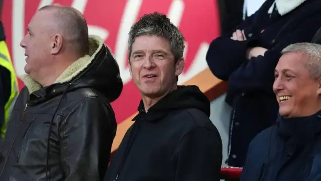 Noel Gallagher in the stands watching Manchester City
