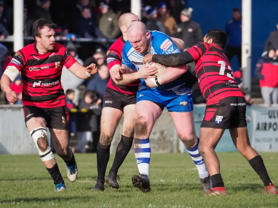 Carl Forster in action for Barrow