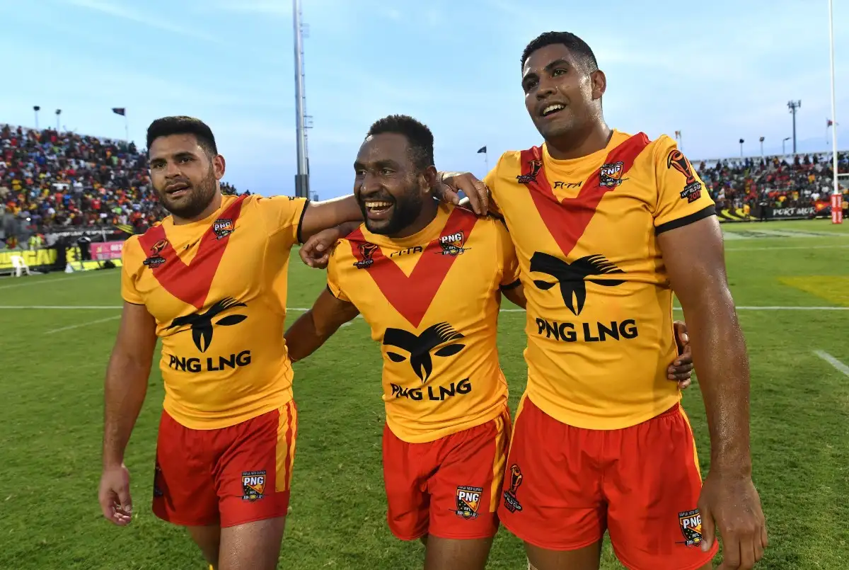 Rhyse Martin, Justin Olam and Nene Macdonald in action for Papua New Guinea