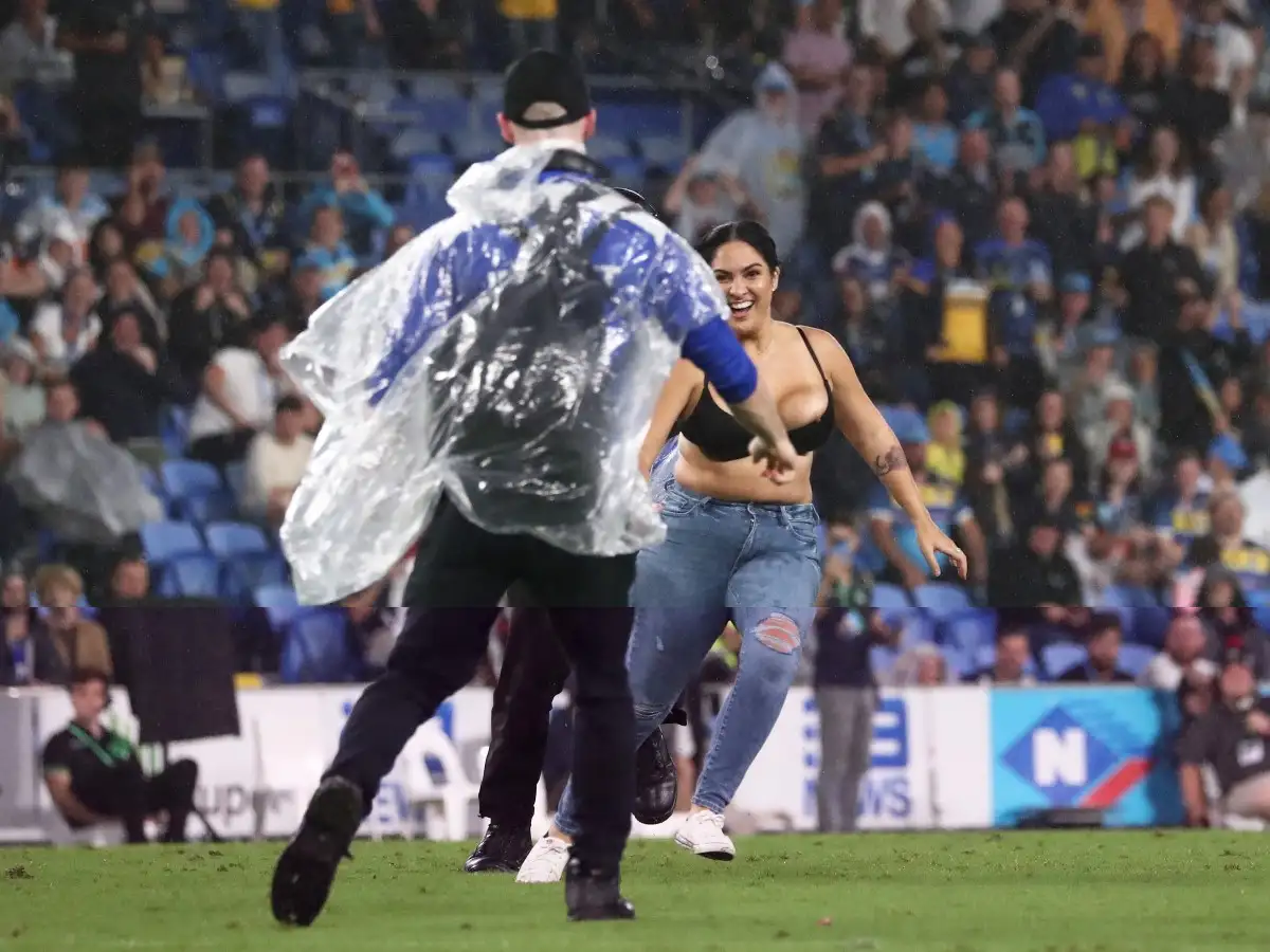Strewth! Pitch invader gets wiped out as two NRL games interrupted