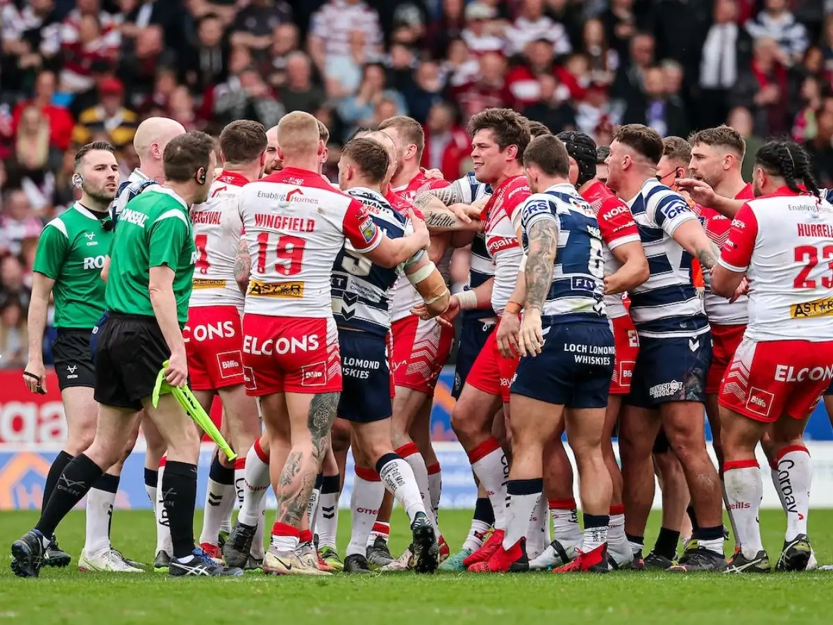 Sam Powell Wigan and St Helens players come together SWpix