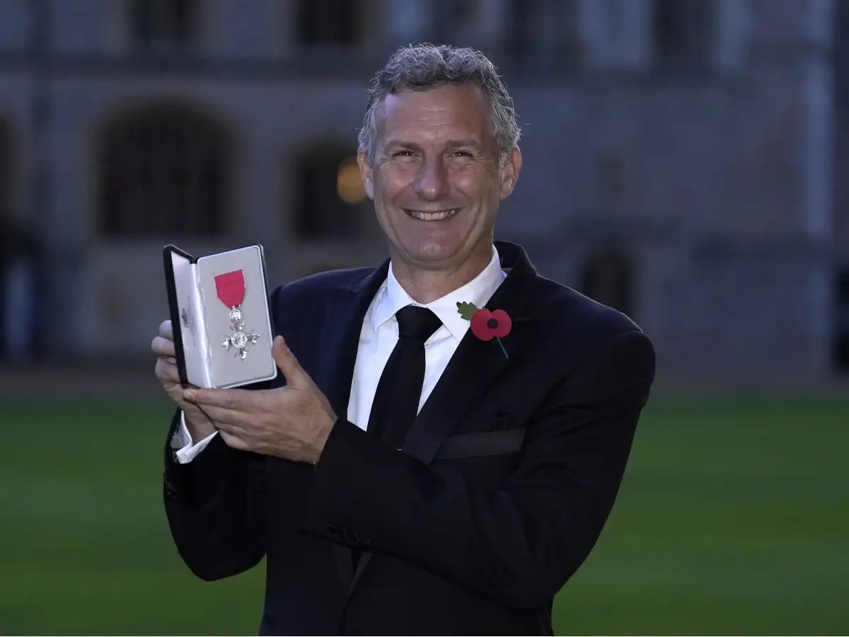 Adam Hills receives MBE for services to Paralympic sport and disability awareness