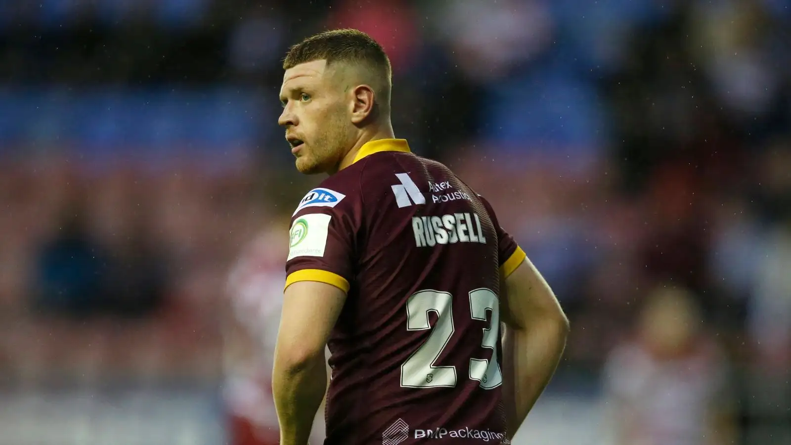 Oliver Russell in action against Wigan at the DW Stadium.