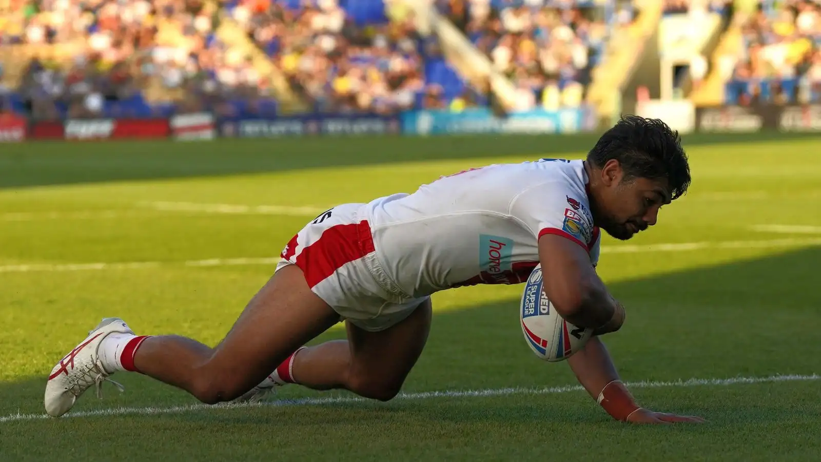 St Helens forward James Bell scores against Warrington. Photo by PA Images / Alamy Stock Photo.