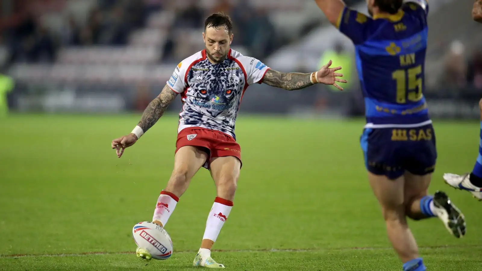 Gareth O'Brien (Leigh Leopards) kicks a drop goal to send Wakefield Trinity down