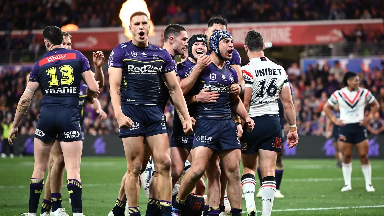 Melbourne Storm celebrate a try against Sydney Roosters