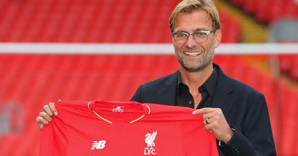 Jurgen Klopp: Poses with the Liverpool shirt