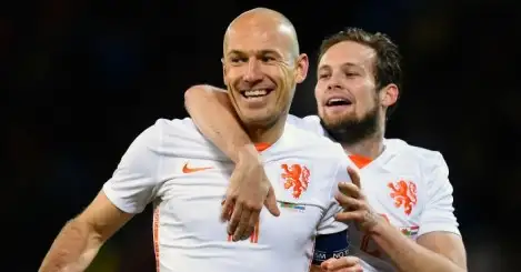 Wales suffer setback as Robben double earns Holland victory
