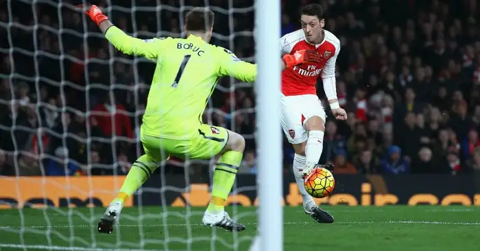 Ozil-inspired Arsenal hit PL summit by beating Bournemouth