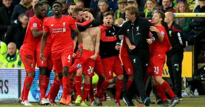 Adam Lallana: Mobbed after Liverpool's winner at Norwich