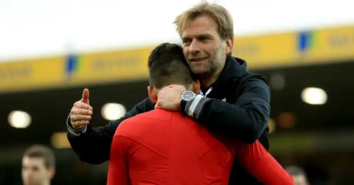 Jurgen Klopp: Celebrates Liverpool's win with Roberto Firmino