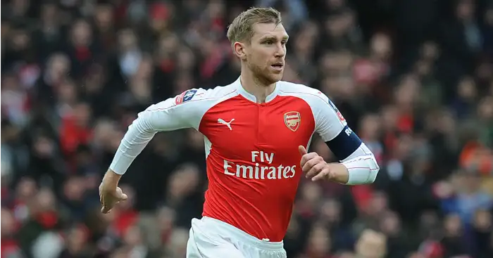 Per Mertesacker: Refusing to give up on title hopes