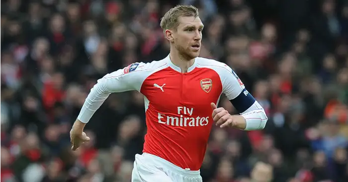 Mertesacker unwavering in belief that Arsenal can still win title