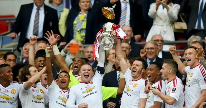 Wayne Rooney: Captain lifts trophy with Michael Carrick