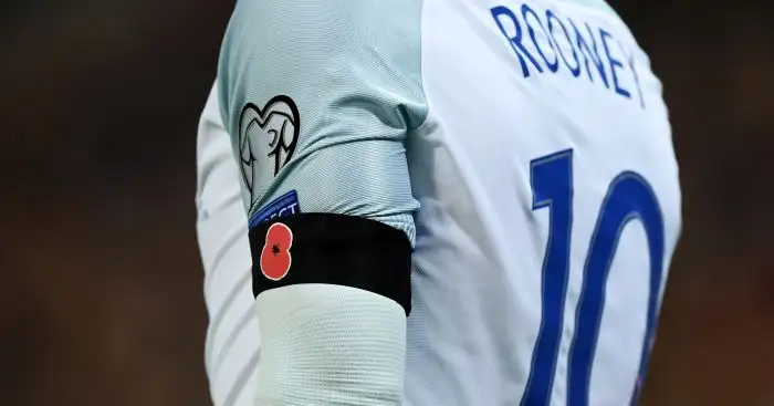 Wayne Rooney: Wears poppy against Scotland