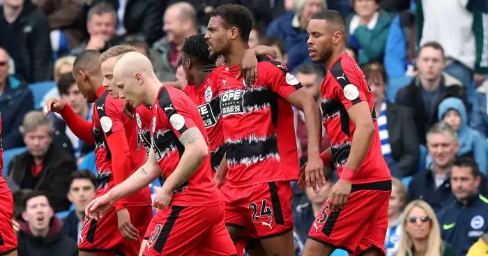 Huddersfield earn crucial point at 10-man Brighton