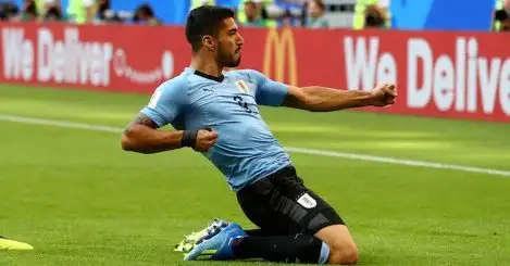 Suarez, Cavani net as Uruguay ease past Russia to seal top spot