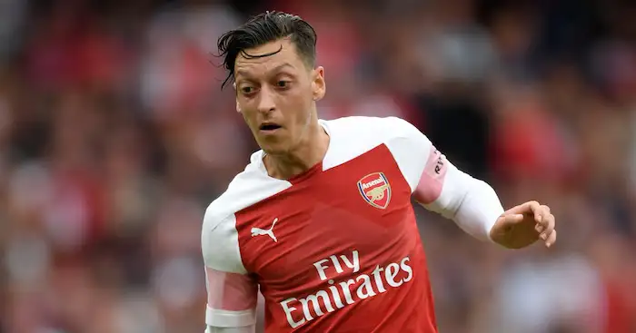 LONDON, ENGLAND - AUGUST 12: Mesut Ozil of Arsenal runs with the ball during the Premier League match between Arsenal FC and Manchester City at Emirates Stadium on August 12, 2018 in London, United Kingdom. (Photo by Shaun Botterill/Getty Images)
