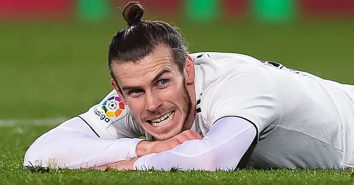 BARCELONA, SPAIN - FEBRUARY 06: Gareth Bale of Real Madrid CF reacts on the pitch after missing a chance to score during the Copa del Semi Final first leg match between Barcelona and Real Madrid at Nou Camp on February 06, 2019 in Barcelona, Spain. (Photo by Alex Caparros/Getty Images)